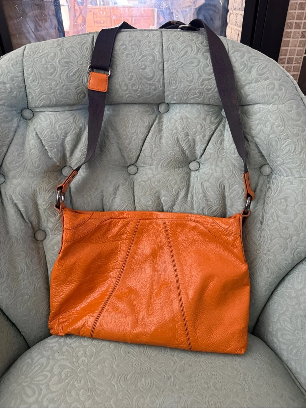 Bright orange HOBO bag